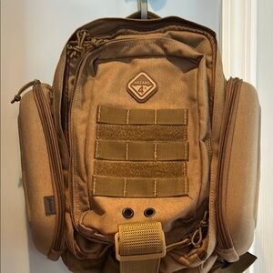 Tan Tactical Backpack with MOLLE Webbing and Durable Fabric
